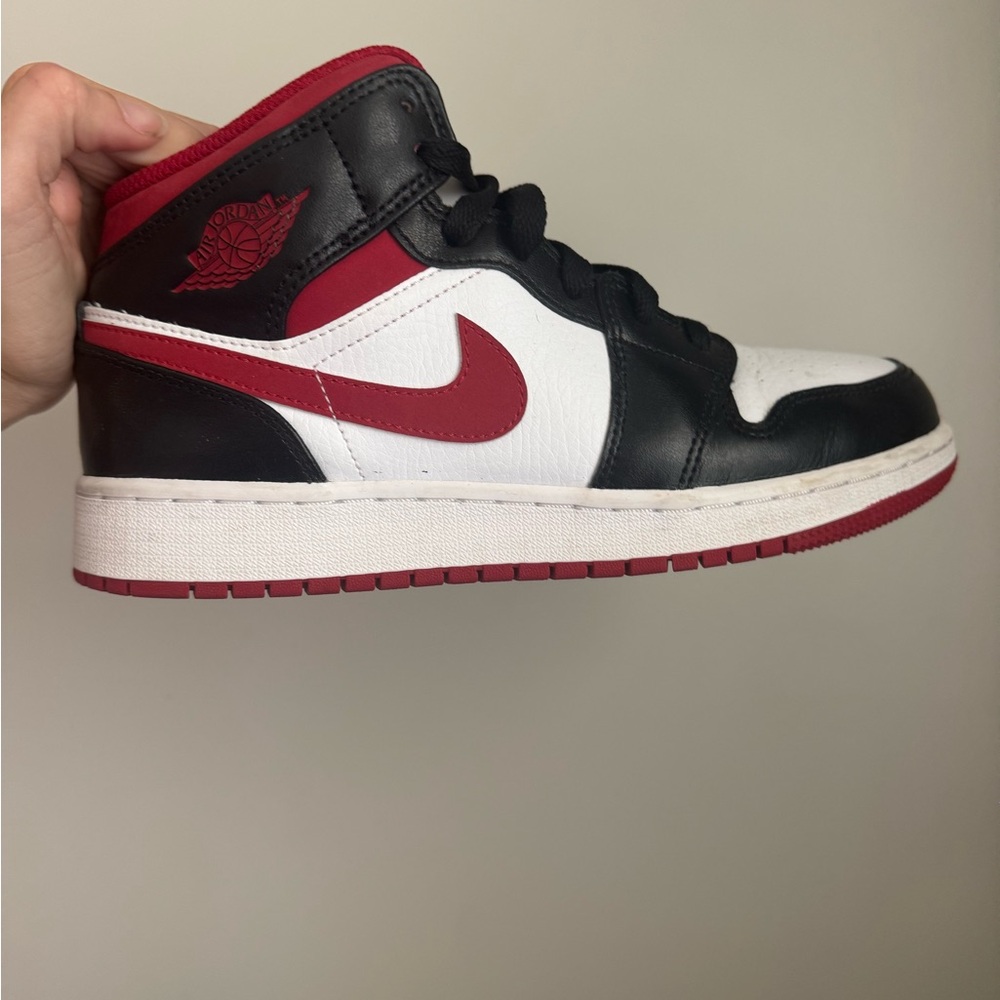 Nike Black, Red, and white air Jordan 1s
